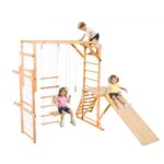 8-viename medinė vaiku žaidimų aikštelė (jungle gym) su čiuožykla ir sūpynėmis, 222 x 225 x 192 cm